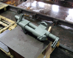 Removed components are not forgotten: this is the damper relay assembly, removed a few months ago and now in grey primer.