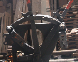 This contraption is the damper control gear from the cab, removed and awaiting attention