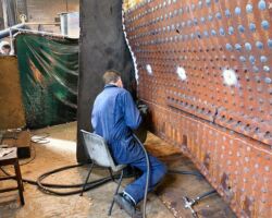 Ian begins work on the boiler. Image: John Oates