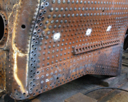 Many of the lower side stays have also been removed and pilot holes drilled in others.