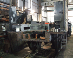 The right hand stretcher can be seen lying on its side; the left hand one has only two of its nine securing bolts and nuts holding it in place.