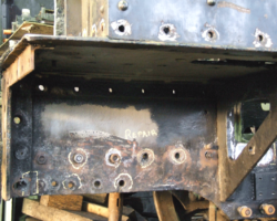 The holes throagh the frames where the lower horizontal stretcher was riveted will be repaired, as they are now oversized.