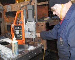 Robin Spain drilling holes using the “Mag Drill” in the bottom plate of the drag box. 19.01.17