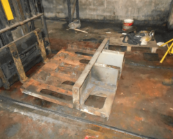 The bottom of the drag box on the forklift truck after removal.