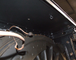 Various parts of the underside of the running plate, finish painted in gloss black.