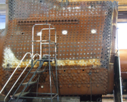 A side on view of the work progressing on the boiler.