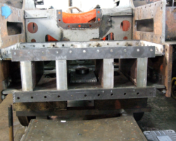 The structure is bolted to the existing frames to ensure alignment when it is welded up solid.