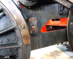 Brake hanger brackets removed from the frames following drilling out the securing rivets.