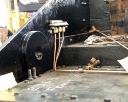 Lubrication pipe runs are being reinstalled, some retaining the original pipework where its condition allows; some must be replaced by new. All oil paths are proved as open as the pipes are installed.