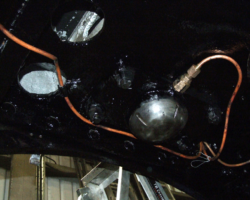 One of the semi-spheres by which the loco’s weight is transferred to the pony truck. Note the oil delivery pipework being refitted and / or renewed.