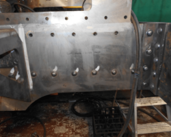 The left hand side showing the new snap had (round head) rivets.