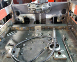 The dragbox top plate, with a riveting hammer lying waiting for use.