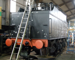 The tender repaint continues, and almost everything is back in black. The work is actually further advanced than these photos show, as the inside of the coal bunker has been taken down to bare metal and all paint coats, including the top coat, applied.