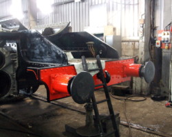 A wider look at the front buffer beam after final painting.