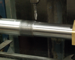 The threads for the head securing nut is obvious and the keyway is being formed.