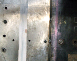 Close up views of the tack welds above the horn gap and at the front lower section.