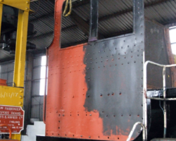 By far the most obvious part replaced is the right hand cab side, presently attached by a few bolts only. It allows the cab panel to be used as a template to drill out the framework behind, when the final rivets will be used. The left hand side will be fitted shortly.