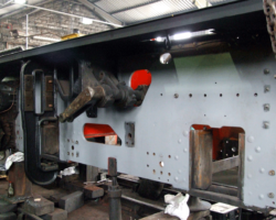 The full length of the left hand frame has now been cleaned down, prepared and given a coat of grey primer.