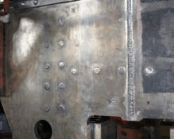 Riveting of the various components around the new piece of the RH frame is now complete.