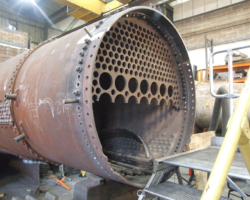 Most of the old front tube plate is still to be removed, but work is well underway.