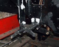 The permanent fixing of the cab side has allowed other items to be fitted, including the damper control gear and, below, the relays to the damper doors once the boiler is back in the frames.