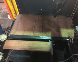 The new cab floorboards are now being cut and assebled by one of the volunteers who is a retired woodwork teacher whose hands can be seen on the left.