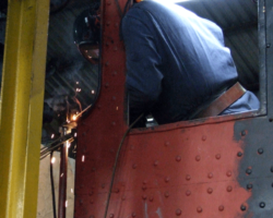 Brian welds together in a nice display of sparks the two pieces on the right hand side.