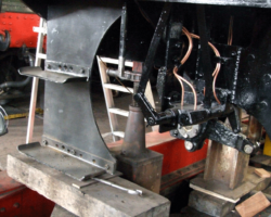 They cannot yet be permanently attached as they will need to be removed to make way for the jacking beam when the loco is being re-wheeled.