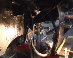 The same area from the front. This time the regulator valve is partially hidden by the jack.