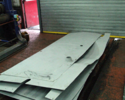 These are mostly pieces of boiler cladding, in primer and awaiting their first undercoat.