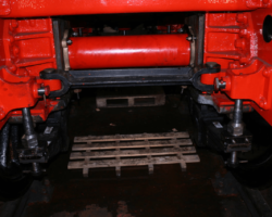 The middle or driving axle with the trailing spring hangers (the big threaded things with the large nuts) in place. Note that the upper pivot pins and the split pins are not correctly fitted yet to allow for checking by the paid staff.