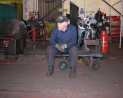 Our Engineering Manager taking a break before tackling the rear or trailing axle’s spring hangers.