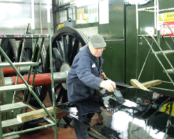 ...while in the paintshop, SVR’s Mick Flint applies gloss black to the boiler cladding sheets.