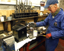 And speaking of the painters, here is the cylinders’ mechanical lubricator receiving attention before going back on the running plate adjacent to its mechanical counterpart.