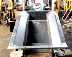 The mounting holes to the firebox foundation ring have been cut.