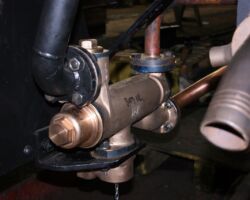 Brian Humphries of the paid staff has fitted the Left hand injector during last week, seen here from the rear of the loco.