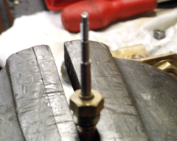 A close up of one of the lubrication parts which deliver oil to the steam chest and cylinders.