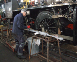 Painting parts of the engine continued, and then moved on to the tender brake pull rod, shown in bare metal last posting.