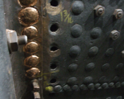 Some have had their square heads removed and have been peened over, as detailed here.