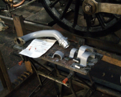 Other parts received coats of grey primer. The pipe is the overflow from the right hand injector, while several brackets also received attention. These were marked to be returned to specific locations, and the labelling had to be returned to areas not newly pained.