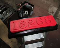 The wooden pattern for the new smokebox number plate...
