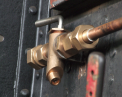 One such item already fitted: the shut-off cock to the ashpan water sprays mounted in the fireman’s side of the cab.