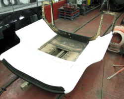 Also in the paint shop is the cab roof, still receiving its white paint.