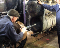 The SVR’s team leader, Graham Bennett, pushes the piston assembly further rearwards.
