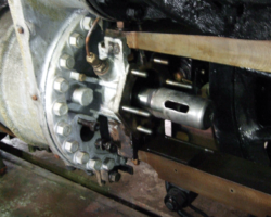 Meanwhile at the back, the piston rod protrudes from the back cover.