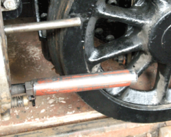 Guides were screwed into the front cover stud holes to support the piston head during insertion.