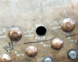 One reason for their not having been fitted is seen on the surrounding steel: Needs weld.