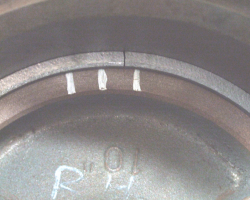 A close up of the ring, with the cut, top.