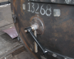 On the smokebox, the door strap and centre boss rivets have all been ground flat.