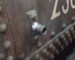 The badly worn handrail mounting sockets had been welded in and the welds dressed.
